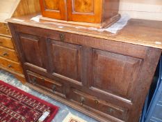AN 18th C. OAK MULE CHEST, THE THREE PANELLED FRONT OVER TWO DRAWERS. W 123 x D 52 x H 80cms.