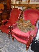 TWO VICTORIAN MAHOGANY SHOW FRAME ARMCHAIRS WITH RED UPHOLSTERED HOOP BACKS AND TURNED FRONT LEGS ON