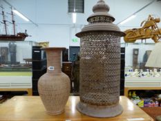 A PIERCED MOORISH STYLE LANTERN AND A POTTERY VASE.