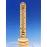 A WATKINS AND HILL MERCURY THERMOMETER MOUNTED VERTICALLY ON AN IVORY SCALE. H 25.5cms.