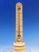 A WATKINS AND HILL MERCURY THERMOMETER MOUNTED VERTICALLY ON AN IVORY SCALE. H 25.5cms.