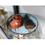 A LARGE ORIENTAL CLOISONNE BOWL, AN ORIENTAL DEITY, AND A TIBETAN MASK.