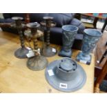 THREE IRON CANDLESTICKS, A CAPSTAN INKWELL AND A PAIR OF VASES.