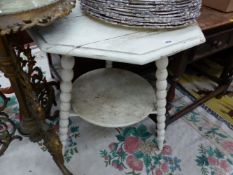 A CREAM PAINTED PINE TABLE, THE OCTAGONAL TOP ON THREE BOBBIN TURNED LEGS JOINED BY A CIRCULAR TIER.