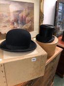 A LOCK & CO TOP HAT AND A WOODROW BOWLER HAT.