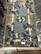 TWO BELOUCH TRIBAL RUGS. TOGETHER WITH AN ANTIQUE CHINESE RUG. 144 x 86, 124 x 83 AND 146 x 81cms (