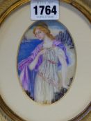 MURIEL V C NUTTALL, AN EARLY 20th C. OVAL PORTRAIT MINIATURE OF MIRANDA ON A ROCKY SEA SHORE. 10 x