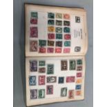 A VINTAGE WORLD STAMP ALBUM.