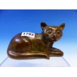 A BRONZE MODEL OF AN ALERT CAT RECLINING. W 14cms.