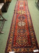 A PERSIAN KARADJA RUNNER. 450 x 100cms