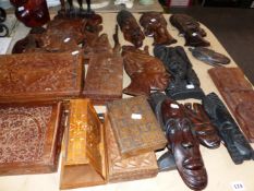 VARIOUS CARVED WALL MASKS AND BOXES.