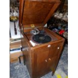 A HMV CABINET GRAMOPHONE MODEL 157 IN AN OAK CABINET FITTED WITH RARE HMV NO. 5 SOUND BOX CIRCA