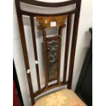 AN ART NOUVEAU MARQUETRIED MAHOGANY CHAIR, THE BACK SPLAT INSET WITH A PLATE ON COPPER LADY TITLED