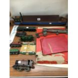 A HORNBY O GAGE CLOCK WORK TRAIN WITH SOME RAIL, AN ELECTRIC HORNBY DUBLO ELECTRIC LOCOMOTIVE,