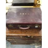 AN ANTIQUE LEATHER TRAVELLING DRESSING CASE, AND AN ANTIQUE LINEN TABLE CLOTH.