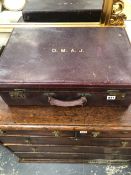 AN ANTIQUE LEATHER TRAVELLING DRESSING CASE, AND AN ANTIQUE LINEN TABLE CLOTH.