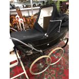 A GOOD QUALITY VINTAGE COACH BUILT PRAM FOR DANIEL NEAL AND A VINTAGE HIGH CHAIR.