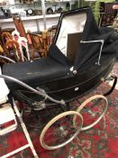 A GOOD QUALITY VINTAGE COACH BUILT PRAM FOR DANIEL NEAL AND A VINTAGE HIGH CHAIR.