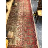 AN ANTIQUE ORIENTAL CARPET. 374 x 283cms