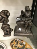A BRONZED PLASTER FIGURE OF A SEATED ANGEL PLAYING A LUTE, INDISTINCTLY SIGNED TOGETHER WITH A