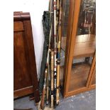 VARIOUS VINTAGE FISHING RODS.