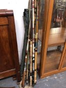 VARIOUS VINTAGE FISHING RODS.