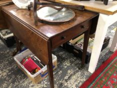 A 19th C. MAHOGANY PEMBROKE TABLE ON BRASS CASTORS.