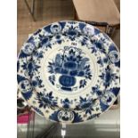 AN 18th C. DELFT BLUE AND WHITE DISH. Dia. 34.5cms.