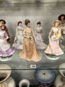 FOURTEEN PORCELAIN FIGURES OF LADIES BY WORCESTER, COALPORT, DOULTON AND OTHERS