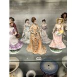 FOURTEEN PORCELAIN FIGURES OF LADIES BY WORCESTER, COALPORT, DOULTON AND OTHERS