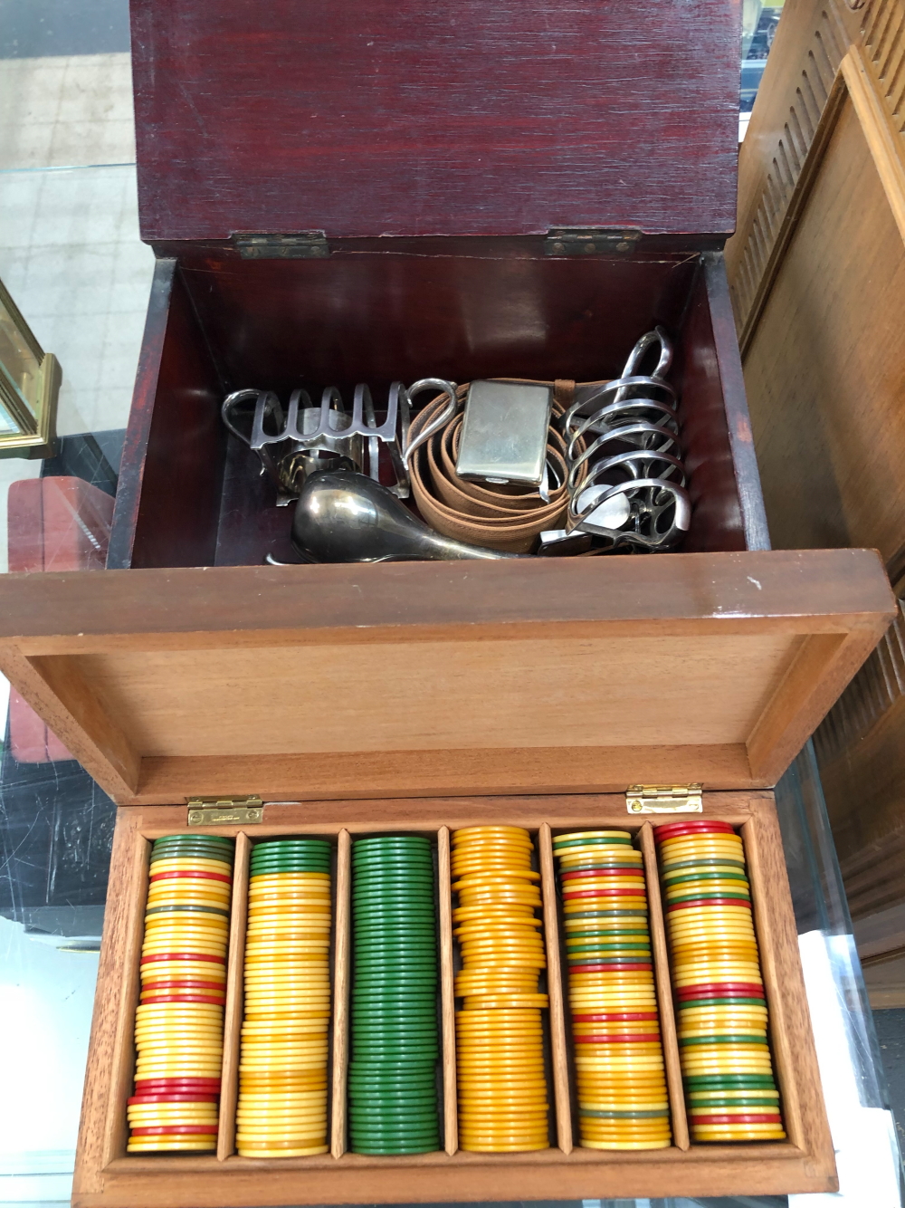 A MAHOGANY BOX OF PLASTIC GAMES COUNTERS TOGETHER WITH ANOTHER BOX OF ELECTROPLATE AND SOME BRASS