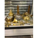 A COLLECTION OF BRASS WARE, TO INCLUDE: A WALL CLOCK, TWO OIL LAMPS, PLATE STANDS, A BELL, ETC.