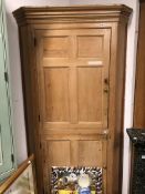 A LARGE GEORGIAN PINE FLOOR STANDING TWO DOOR CORNER CABINET. W 109 X D 71 X H 202cms.