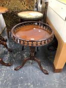 A VINTAGE FRENCH STYLE MARBLE TOPPED OCCASIONAL TABLE WITH BRASS GALLERY AND A LATER MAHOGANY