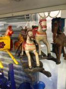 A COLLECTION OF PAINTED WOOD HORSES, OTHER ANIMALS, A CART, A COT, ETC.
