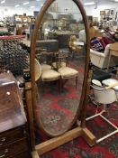 AN ART DECO CONTINENTAL CHEVAL MIRROR. H 174 X W 181cms.