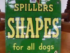 A GREEN GROUND ENAMEL SIGN FOR SPILLERS SHAPES. 30.5 x 30.5cms.