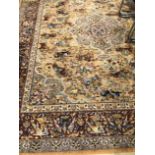 (C) A MACHINE MADE RUG OF PERSIAN HUNTING DESIGN, 340 x 264cms.