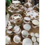 A SERVICE OF ROYAL ALBERT OLD COUNTRY ROSE PATTERN WARES, TO INCLUDE: EGG CUPS, TWO TEA POTS AND