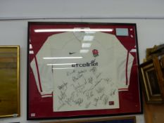 A ENGLAND RUGBY SHIRT SIGNED BY WHOLE SQUAD.