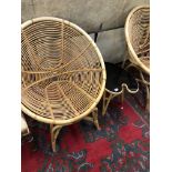 A PAIR OF RETRO BAMBOO TUB CHAIRS AND A PALETTE SHAPED COFFEE TABLE.