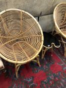 A PAIR OF RETRO BAMBOO TUB CHAIRS AND A PALETTE SHAPED COFFEE TABLE.