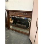 A LARGE VICTORIAN OAK OVER MANTLE MIRRROR.