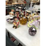 EIGHT VARIOUS TOBY JUGS, A DOULTON FIGURE, TWO BUBBLED GLASS PAPERWEIGHTS AND A WORCESTER CUP AND