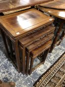 A NEST OF FOUR ORIENTAL HARDWOOD TABLES.