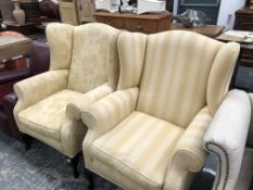 TWO SIMILAR WING BACK ARM CHAIRS.