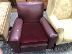 AN ART DECO LEATHER UPHOLSTERED CLUB ARMCHAIR.