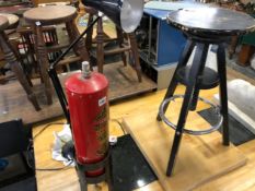 AN ANGLE POISE LAMP, A VINTAGE FIRE EXTINGUISHER AND A STOOL.