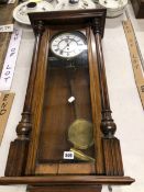 A VICTORIAN WALL CLOCK.