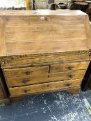 A GEORGIAN STYLE OAK BUREAU.